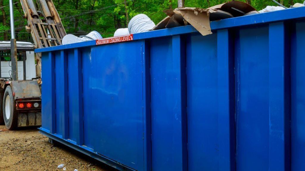 A small 10-yard dumpster used for home cleanout projects.